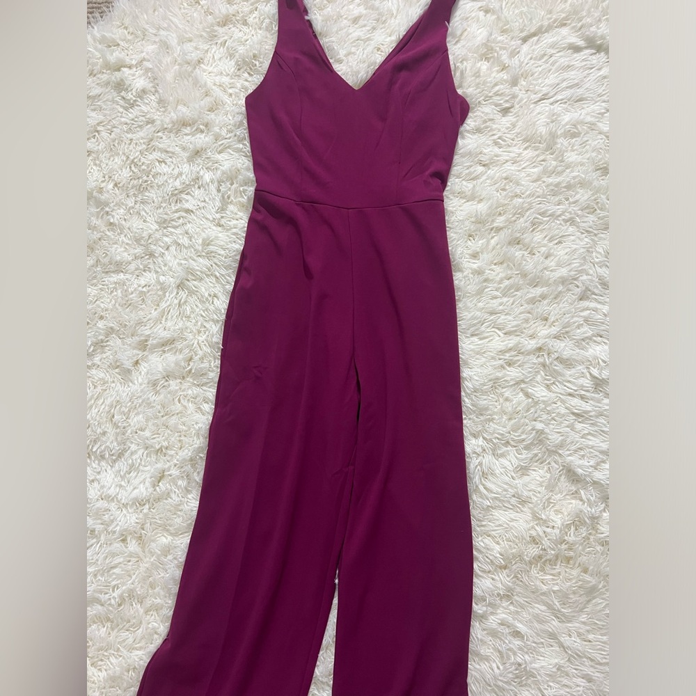 Pink romper, size small, never worn